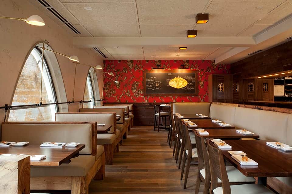 A wide angle view of the dining room at Uchi Houston.