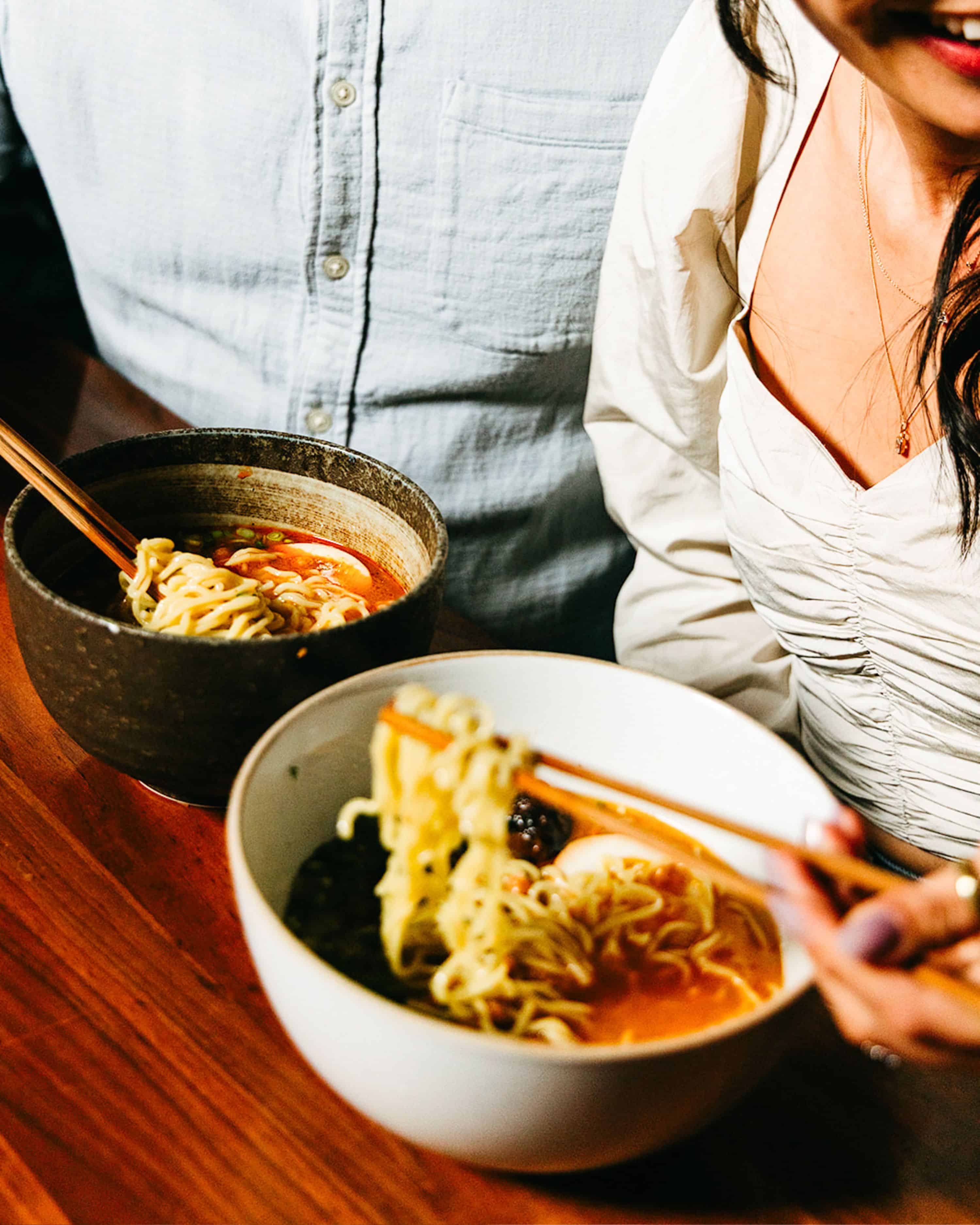 couple eating ramen at uchiba austin