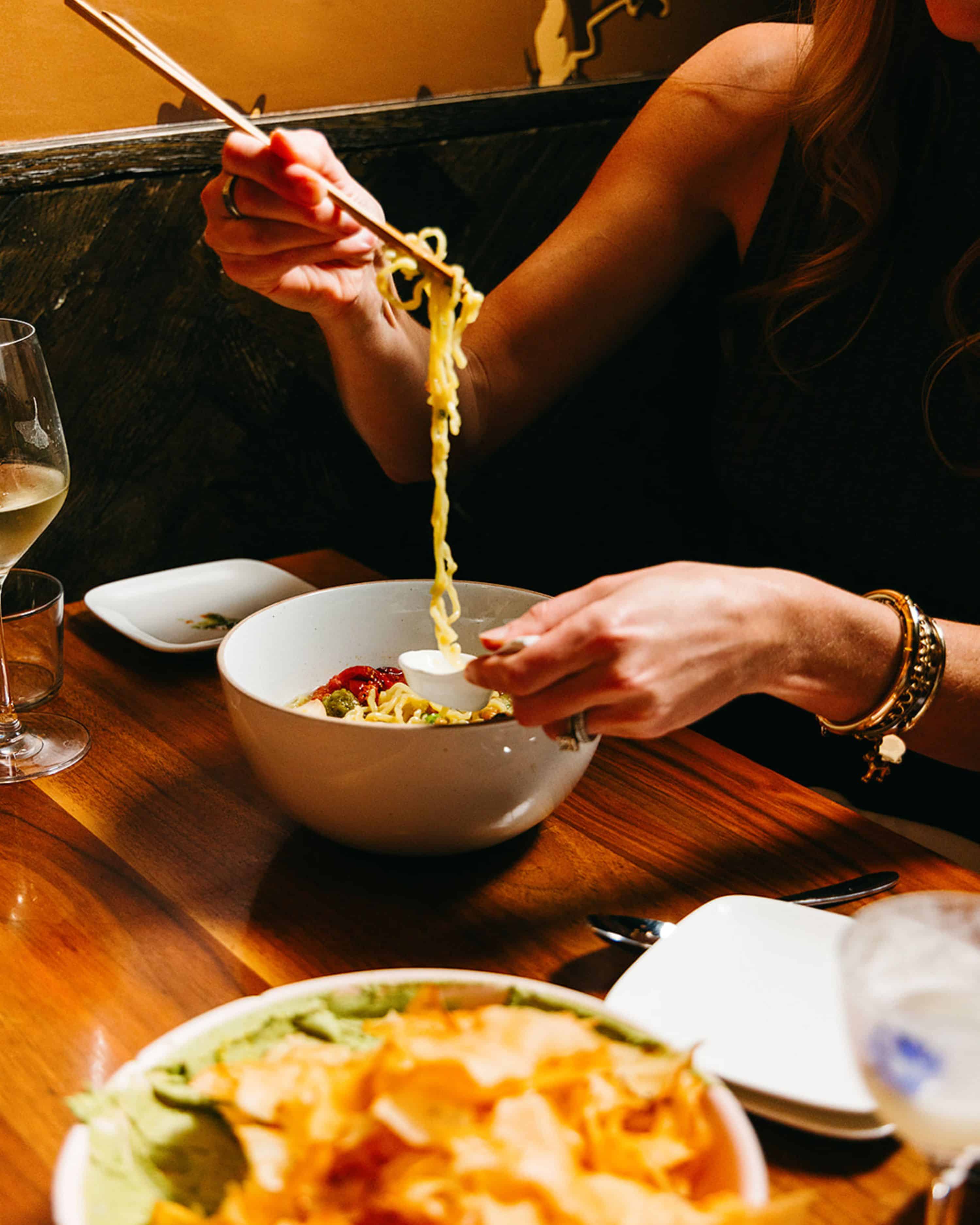 guest enjoying ramen at uchiba dallas